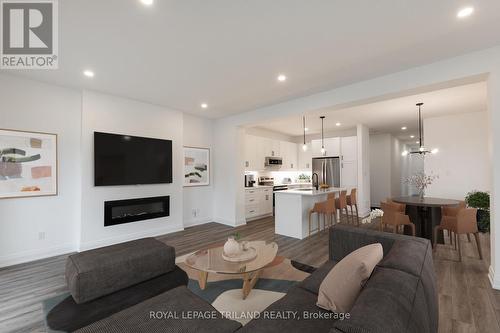 12 - 101 Swales Avenue, Strathroy-Caradoc (Sw), ON - Indoor Photo Showing Living Room With Fireplace