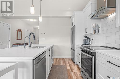 55 619 Evergreen Boulevard, Saskatoon, SK - Indoor Photo Showing Kitchen With Upgraded Kitchen