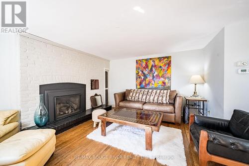 1002 Ontario Street, Cobourg, ON - Indoor Photo Showing Living Room With Fireplace