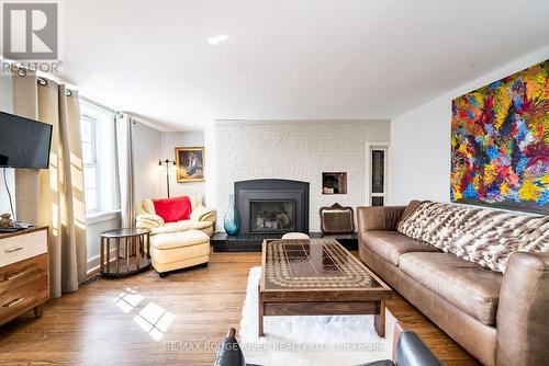 1002 Ontario Street, Cobourg, ON - Indoor Photo Showing Living Room With Fireplace