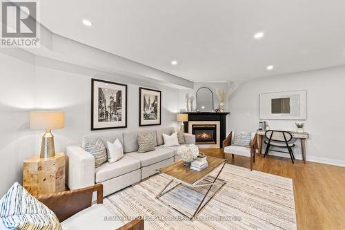 34 Bach Avenue, Whitby, ON - Indoor Photo Showing Living Room With Fireplace