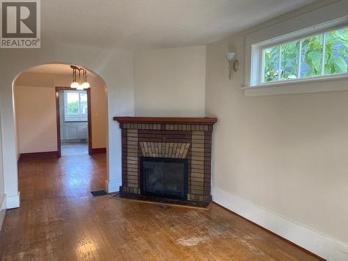 1345 Thom  Street, Trail, BC - Indoor Photo Showing Living Room With Fireplace