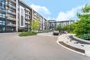 625 - 128 Grovewood Common, Oakville, ON  - Outdoor With Balcony With Facade 