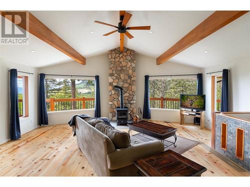 2078 Huckleberry Road, Kelowna, BC - Indoor Photo Showing Living Room With Fireplace