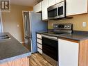 2035 Baron Road Unit# 306, Kelowna, BC  - Indoor Photo Showing Kitchen With Double Sink 