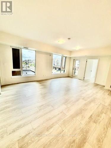 218 - 1440 Clarriage Court, Milton, ON - Indoor Photo Showing Living Room