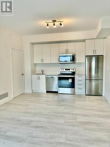 218 - 1440 Clarriage Court, Milton, ON - Indoor Photo Showing Kitchen With Stainless Steel Kitchen