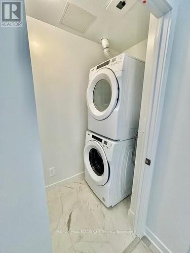 218 - 1440 Clarriage Court, Milton, ON - Indoor Photo Showing Laundry Room