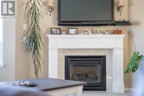 80-1950 Braeview Place, Kamloops, BC - Indoor Photo Showing Living Room With Fireplace