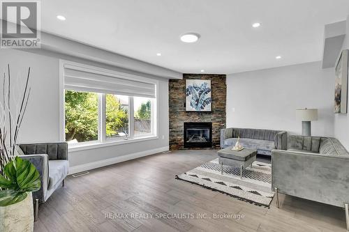 92 Pebblecreek Drive, Kitchener, ON - Indoor Photo Showing Living Room With Fireplace