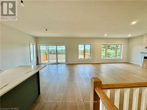 48 John Crescent, Brockton, ON - Indoor Photo Showing Other Room With Fireplace