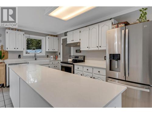 9742 Blackwater Road, Prince George, BC - Indoor Photo Showing Kitchen With Double Sink