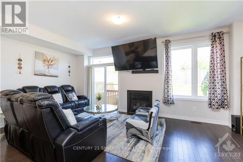 516 Enclave Lane, Clarence-Rockland, ON - Indoor Photo Showing Living Room With Fireplace