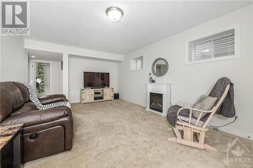 268 Argonaut Circle, Ottawa, ON - Indoor Photo Showing Living Room With Fireplace