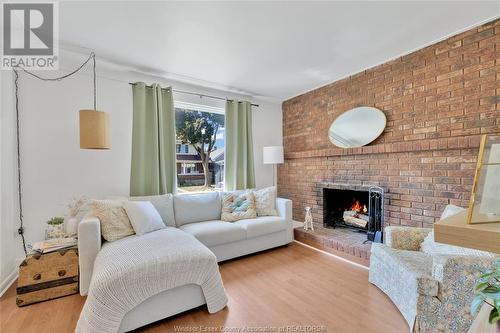 1574 Hall, Windsor, ON - Indoor Photo Showing Living Room With Fireplace