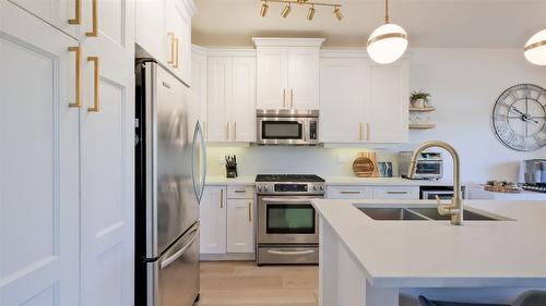 2102-4042 Pritchard Drive, West Kelowna, BC - Indoor Photo Showing Kitchen With Stainless Steel Kitchen With Double Sink With Upgraded Kitchen