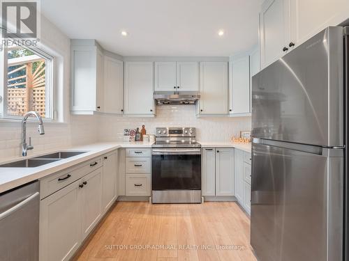 91 Hollyberry Trail, Toronto, ON - Indoor Photo Showing Kitchen With Stainless Steel Kitchen With Double Sink With Upgraded Kitchen