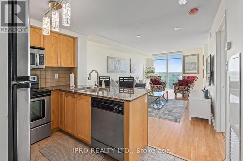 1606 - 9 George Street, Brampton, ON - Indoor Photo Showing Kitchen With Double Sink