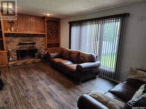 139 Neusch Crescent, Saskatoon, SK - Indoor Photo Showing Living Room With Fireplace