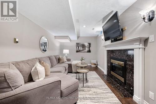 62 Deverell Street, Whitby, ON - Indoor Photo Showing Living Room With Fireplace