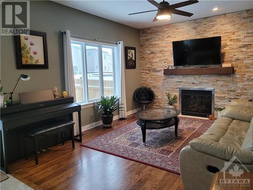 115 Sirocco Crescent, Ottawa, ON - Indoor Photo Showing Living Room With Fireplace