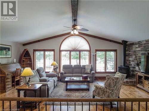 165 Lakeshore Drive, Hastings Highlands, ON - Indoor Photo Showing Living Room With Fireplace