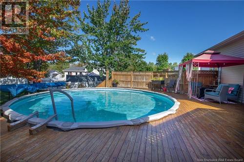 24 Alberta Court, Dieppe, NB - Outdoor With Above Ground Pool With Backyard