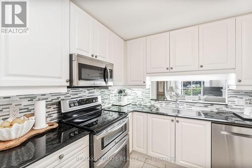 203 - 3085 Bloor Street W, Toronto, ON - Indoor Photo Showing Kitchen With Stainless Steel Kitchen With Upgraded Kitchen