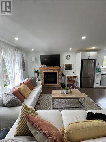 587 Dorcas Bay Road, Northern Bruce Peninsula, ON - Indoor Photo Showing Living Room With Fireplace