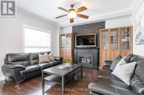 30 Connaught Lane, Barrie, ON - Indoor Photo Showing Living Room With Fireplace