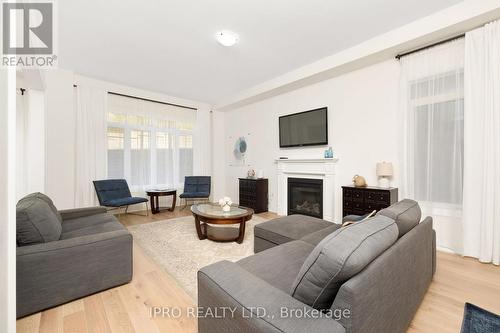 115 Muirfield Drive, Barrie, ON - Indoor Photo Showing Living Room With Fireplace