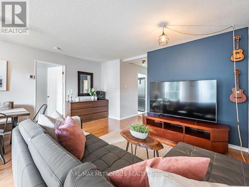 301 - 80 Charles Street E, Toronto, ON - Indoor Photo Showing Living Room