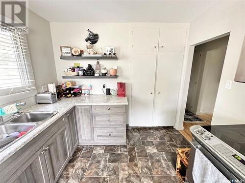 223 4Th Street, Weyburn, SK - Indoor Photo Showing Kitchen With Double Sink