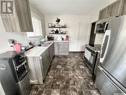 223 4Th Street, Weyburn, SK - Indoor Photo Showing Kitchen With Stainless Steel Kitchen With Double Sink