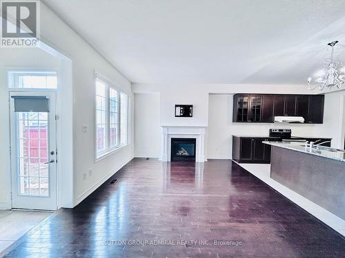 10587 Woodbine Avenue, Markham, ON - Indoor Photo Showing Living Room With Fireplace