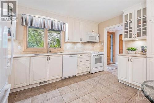 Renovated kitchen with timeless and classic design choices - 7 Lockview Road, Ottawa, ON - Indoor Photo Showing Kitchen