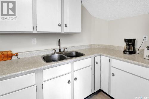 411 D Avenue S, Saskatoon, SK - Indoor Photo Showing Kitchen With Double Sink