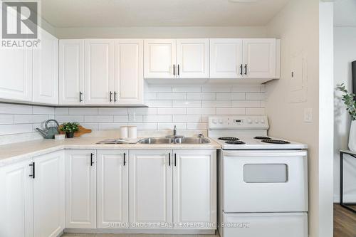 Ph-2 - 1100 Caven Street, Mississauga, ON - Indoor Photo Showing Kitchen With Double Sink