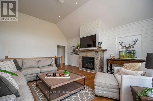 115 Hall Drive, Galway-Cavendish And Harvey, ON - Indoor Photo Showing Living Room With Fireplace