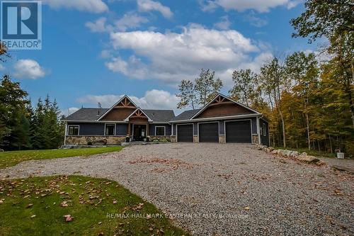 115 Hall Drive, Galway-Cavendish And Harvey, ON - Outdoor With Deck Patio Veranda With Facade