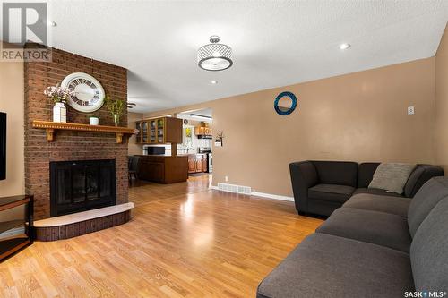 242 Smith Street, Regina, SK - Indoor Photo Showing Living Room With Fireplace