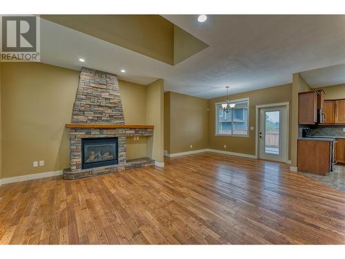 3828 Atkinson Place, Armstrong, BC - Indoor Photo Showing Living Room With Fireplace