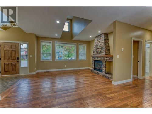 3828 Atkinson Place, Armstrong, BC - Indoor Photo Showing Living Room With Fireplace