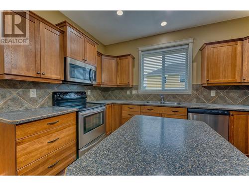 3828 Atkinson Place, Armstrong, BC - Indoor Photo Showing Kitchen With Double Sink