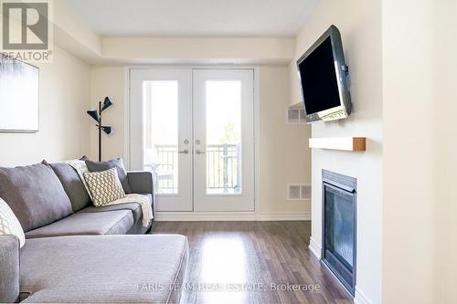 205 - 6 Anchorage Crescent, Collingwood, ON - Indoor Photo Showing Living Room With Fireplace