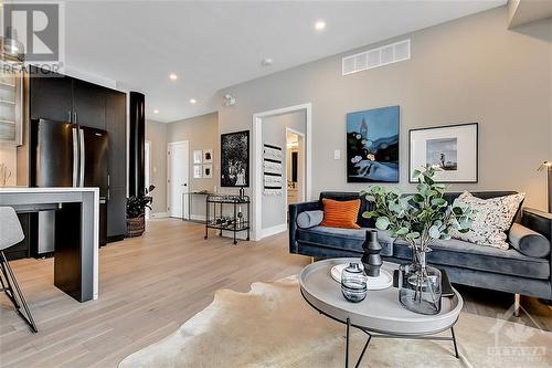 Open Concept Living Area. Images provided are to showcase builder finishes. - 3600 Brian Coburn Boulevard Unit#2311, Ottawa, ON - Indoor Photo Showing Living Room