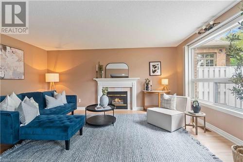 112 Stone Church Road W, Hamilton, ON - Indoor Photo Showing Living Room With Fireplace