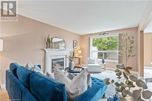 112 Stone Church Road W, Hamilton, ON - Indoor Photo Showing Living Room With Fireplace