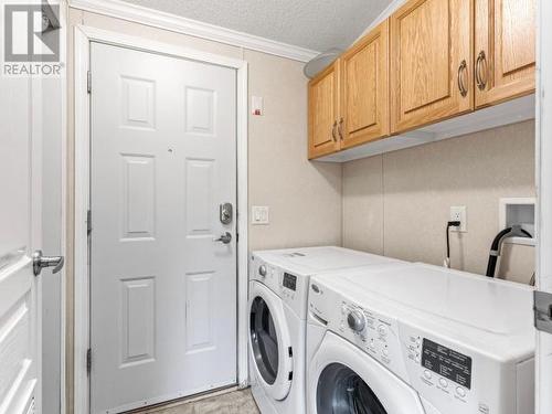 24 Sawmill Road, Teslin, YT - Indoor Photo Showing Laundry Room