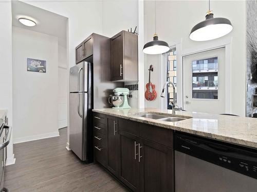 401-662 Goldstream Ave, Langford, BC - Indoor Photo Showing Kitchen With Stainless Steel Kitchen With Double Sink